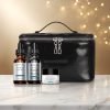 SkinCeuticals holiday kit on a white marble table