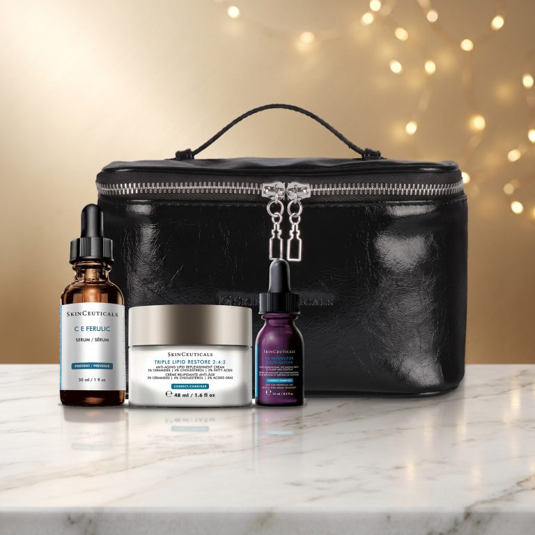 SkinCeuticals holiday kit on a white marble table